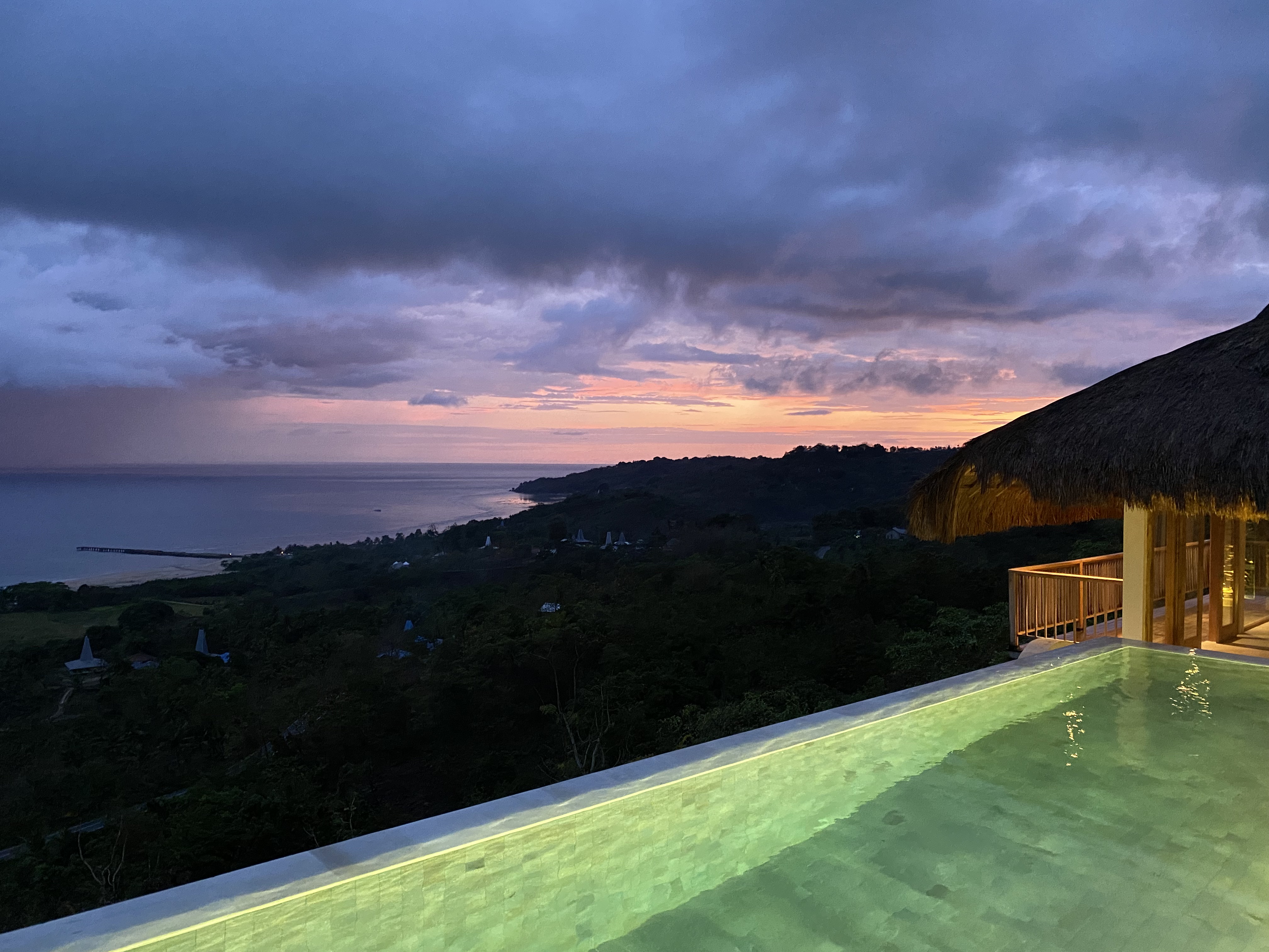 Infinity pool at dusk above the Indian Ocean, Umarato, West Sumba